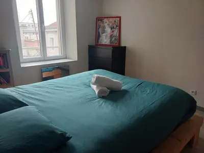Un ou plusieurs lits dans un hébergement de l'établissement Le grenier à sel, Chaleureux 2 Chambres-Centre-Gare
