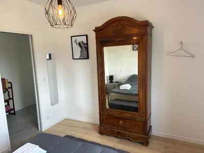 Un ou plusieurs lits dans un hébergement de l'établissement Maison tout confort dans la nature à côté de Disneyland Paris