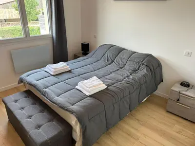 Un ou plusieurs lits dans un hébergement de l'établissement Maison tout confort dans la nature à côté de Disneyland Paris