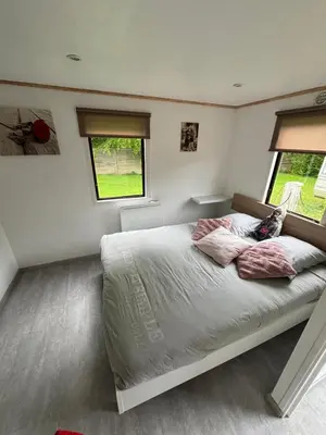 Un ou plusieurs lits dans un hébergement de l'établissement Mobil-home camping 4 étoiles N35