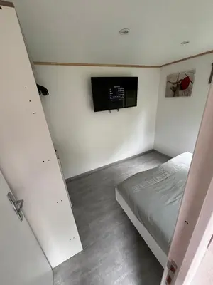 Télévision ou salle de divertissement dans l'établissement Mobil-home camping 4 étoiles N35
