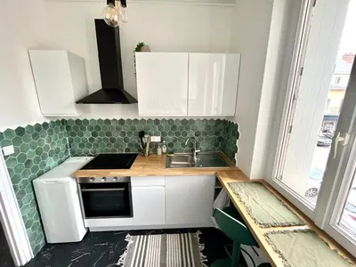 Cuisine ou kitchenette dans l'établissement Appartement entier en plein coeur du centre ville