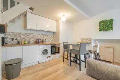 Cuisine ou kitchenette dans l'établissement Triplex cosy