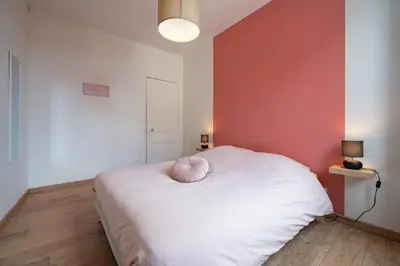 Un ou plusieurs lits dans un hébergement de l'établissement Appartement Centre-Ville 2/4 personnes