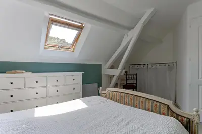 Un ou plusieurs lits dans un hébergement de l'établissement Villa Jeannot - Maison avec jardin