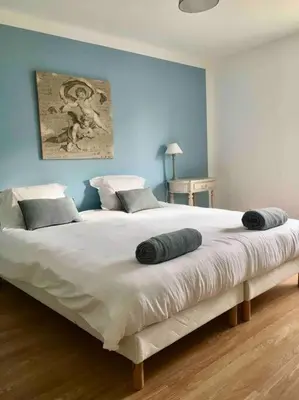 Un ou plusieurs lits dans un hébergement de l'établissement Charmant havre de paix à la campagne