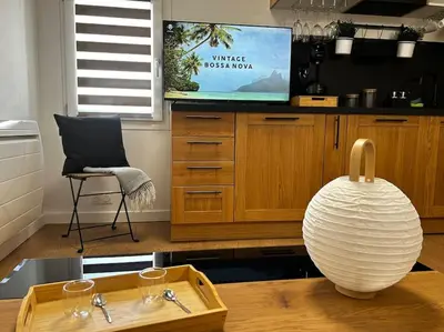 Télévision ou salle de divertissement dans l'établissement Studio cosy rémois