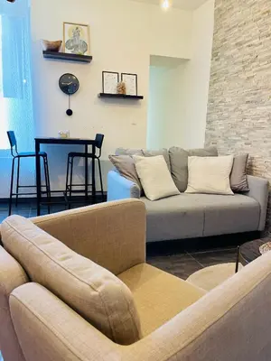 Coin salon dans l'établissement La Chambre St Vincent
