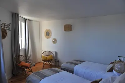 Un ou plusieurs lits dans un hébergement de l'établissement L'Appart Gîte de Charme