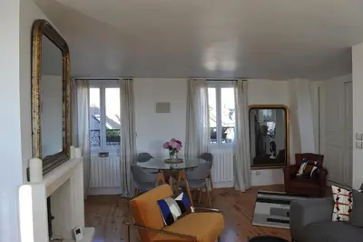 Coin salon dans l'établissement L'Appart Gîte de Charme