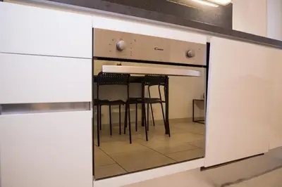 Cuisine ou kitchenette dans l'établissement Agréable Studio calme 2 pers