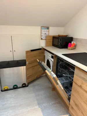 Cuisine ou kitchenette dans l'établissement La Belle Cachette