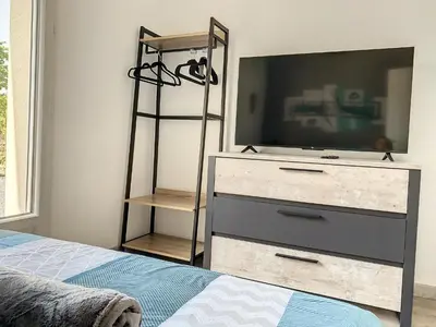 Un ou plusieurs lits dans un hébergement de l'établissement Magnifique villa 12 pers - 6 chambres avec salle de bain privative au Calme - 30 min Asterix - Ecrin de charme