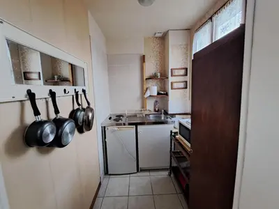 Cuisine ou kitchenette dans l'établissement LOCATION à COUCY LE CHATEAU