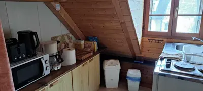 Cuisine ou kitchenette dans l'établissement LOCATION à COUCY LE CHATEAU