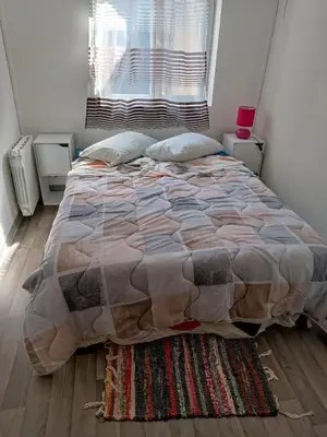 Un ou plusieurs lits dans un hébergement de l'établissement Logement 1
