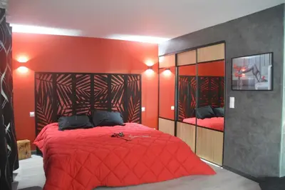 Un ou plusieurs lits dans un hébergement de l'établissement Love Room insolite Erotika