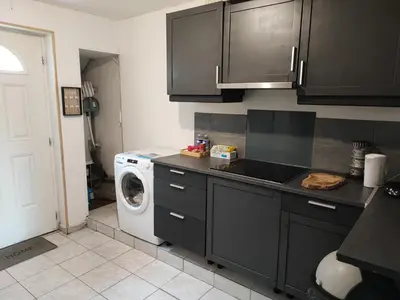 Cuisine ou kitchenette dans l'établissement Maison 2 chambres Centre-Ville