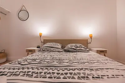 Un ou plusieurs lits dans un hébergement de l'établissement 2 chambres - Centre Gare