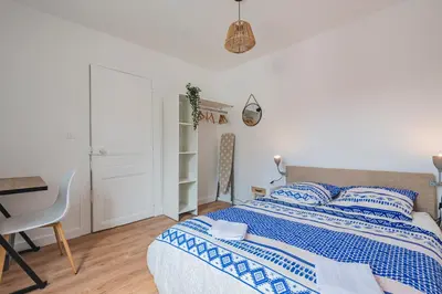 Un ou plusieurs lits dans un hébergement de l'établissement 2 chambres - Centre Gare