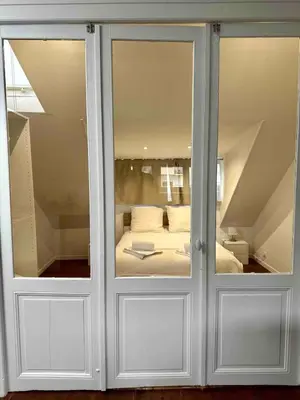 Un ou plusieurs lits dans un hébergement de l'établissement Le Champagne Perché#reims