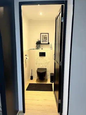 Salle de bains dans l'établissement Chez Hervé et Nicky