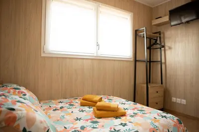 Un ou plusieurs lits dans un hébergement de l'établissement La Cabane de Camille