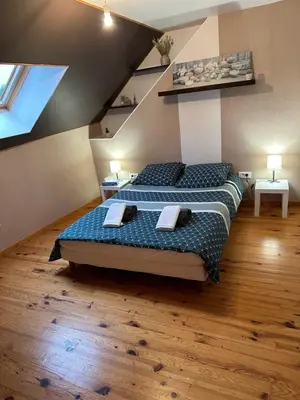 Un ou plusieurs lits dans un hébergement de l'établissement La maison des copains