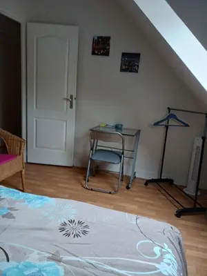 Un ou plusieurs lits dans un hébergement de l'établissement Chambres chez l habitant