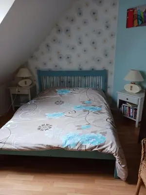 Un ou plusieurs lits dans un hébergement de l'établissement Chambres chez l habitant