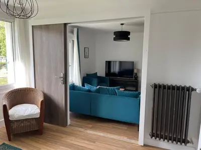 Télévision ou salle de divertissement dans l'établissement GÎTES Maisons de Champagnes