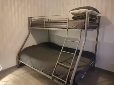 Un ou plusieurs lits superposés dans un hébergement de l'établissement La petite maison