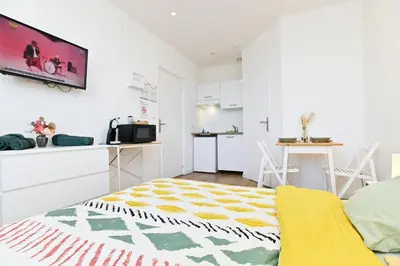 Télévision ou salle de divertissement dans l'établissement TC Residences - Charmant Appartement