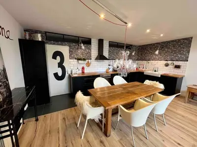 Cuisine ou kitchenette dans l'établissement Rare ! LOFT Atypique Centre-Ville Parking Jardin