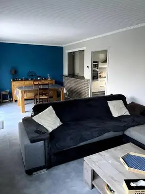 Coin salon dans l'établissement Maison avec jardin