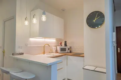 Cuisine ou kitchenette dans l'établissement La verrière Rémoise