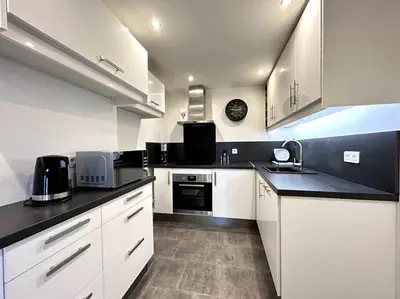 Cuisine ou kitchenette dans l'établissement Le Domaine