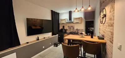 Cuisine ou kitchenette dans l'établissement Le Clos Maldier - Gîte Les Ecureuils