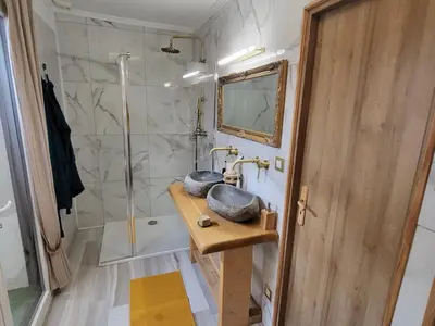 Salle de bains dans l'établissement Choisy le Jacuzzi