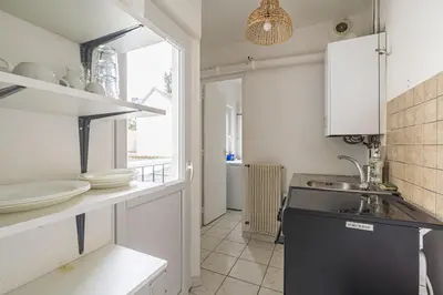 Cuisine ou kitchenette dans l'établissement Pentagone 23 Stade de Reims