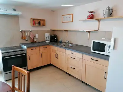 Cuisine ou kitchenette dans l'établissement Gite du Jardin Roy