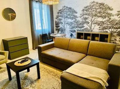 Coin salon dans l'établissement Appartement cosy au cœur du vignoble - proche Épernay en Champagne
