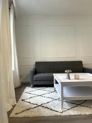 Coin salon dans l'établissement Le petit Paris Compiegne
