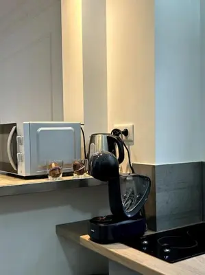 Cuisine ou kitchenette dans l'établissement Le petit Paris Compiegne