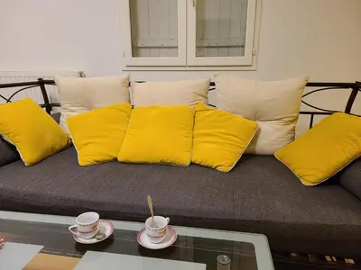 Coin salon dans l'établissement Charmante maison