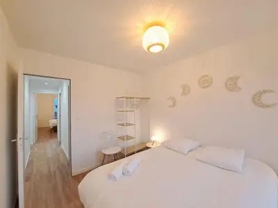 Un ou plusieurs lits dans un hébergement de l'établissement Appartement 