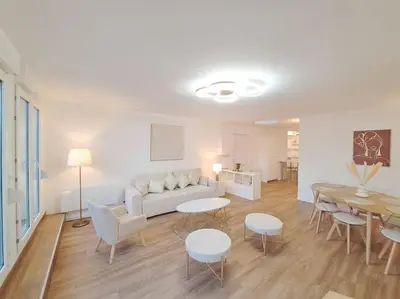 Un ou plusieurs lits dans un hébergement de l'établissement Appartement 