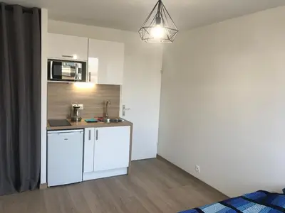 Cuisine ou kitchenette dans l'établissement IKIZEN - Arena Confort - Boulingrin