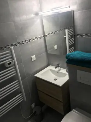 Salle de bains dans l'établissement IKIZEN - Arena Confort - Boulingrin