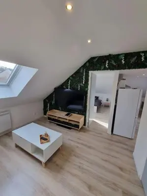 Cuisine ou kitchenette dans l'établissement Cosy appartement proche Disneyland